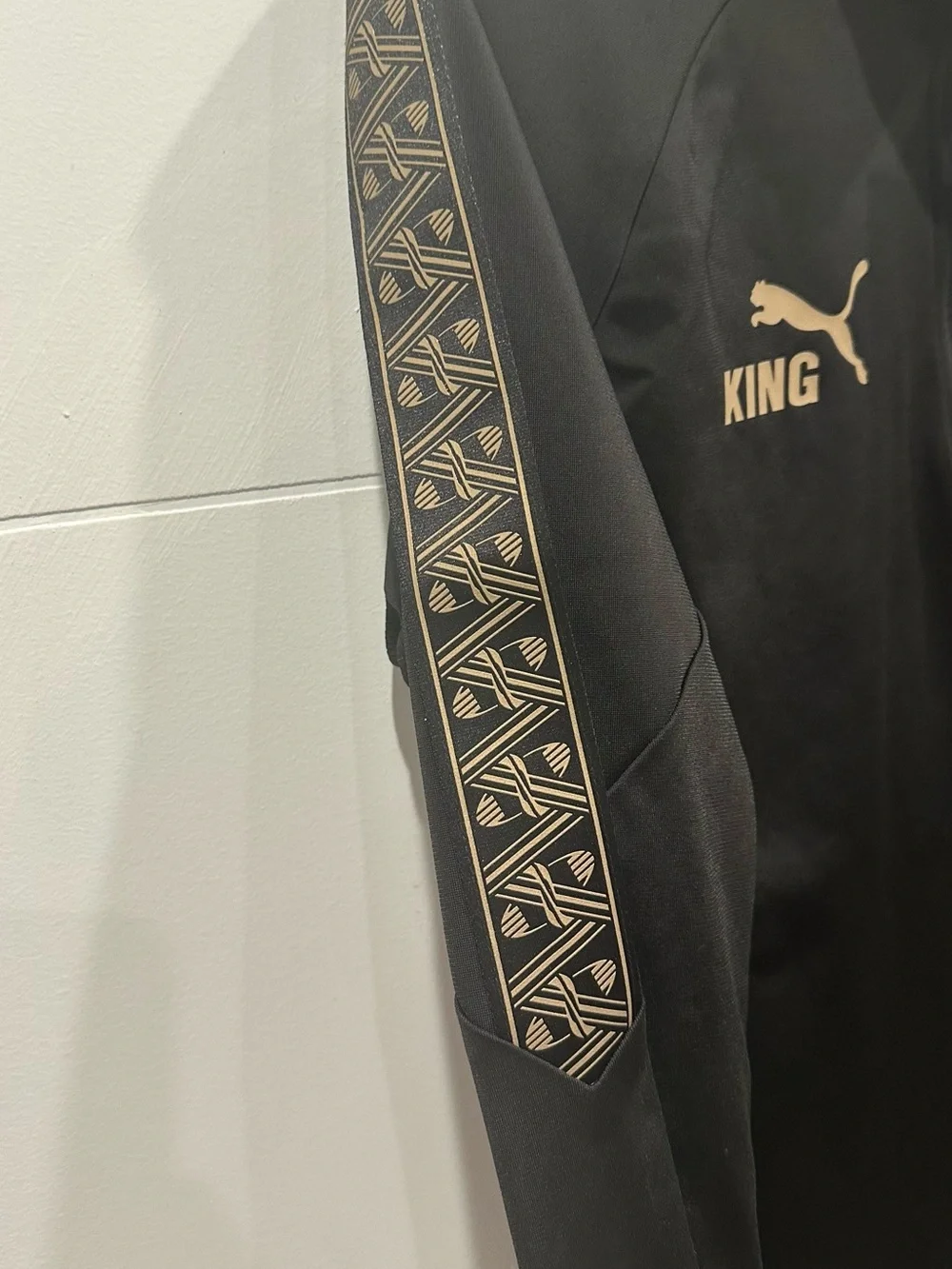Puma King Black Jacket with Gold Accents